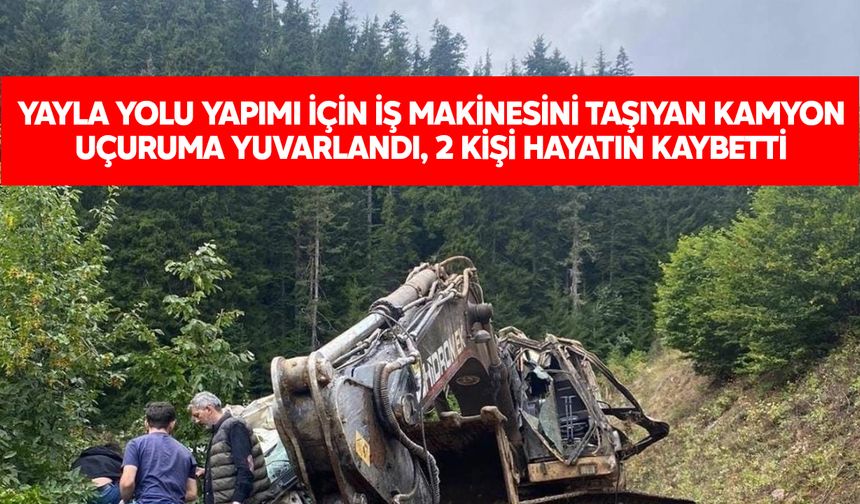 İş makinesi yüklü kamyon uçuruma yuvarlandı: 2 ölü